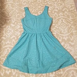 Retro 50s teal dress with subtle rose pattern